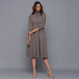 Front View of a Model wearing Ash Grey Flannel High Neck Midi Dress