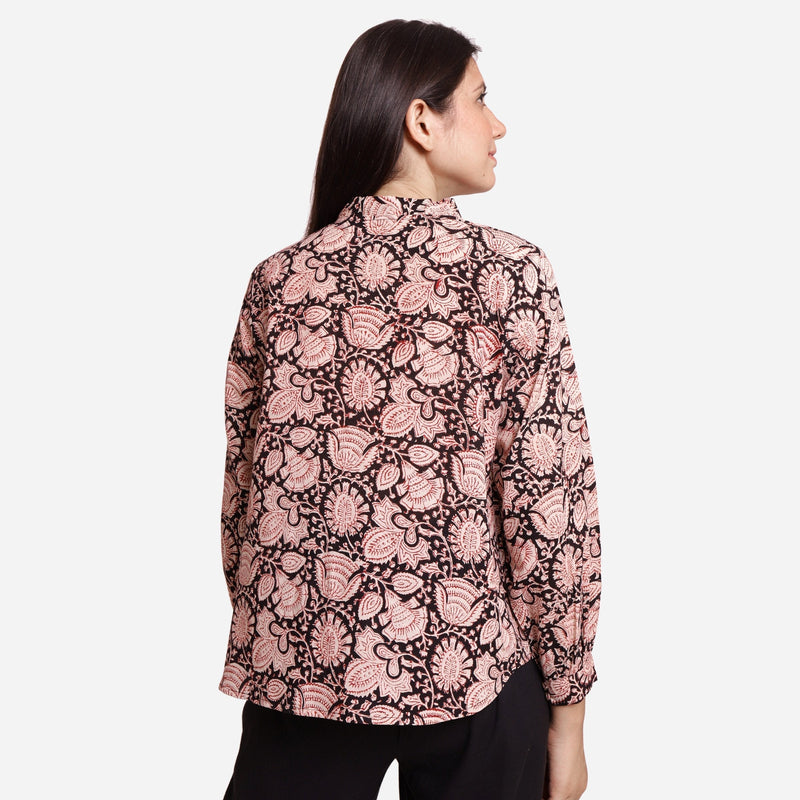 Back View of a Model wearing Black Floral Block Printed Asymmetric Cotton Shirt
