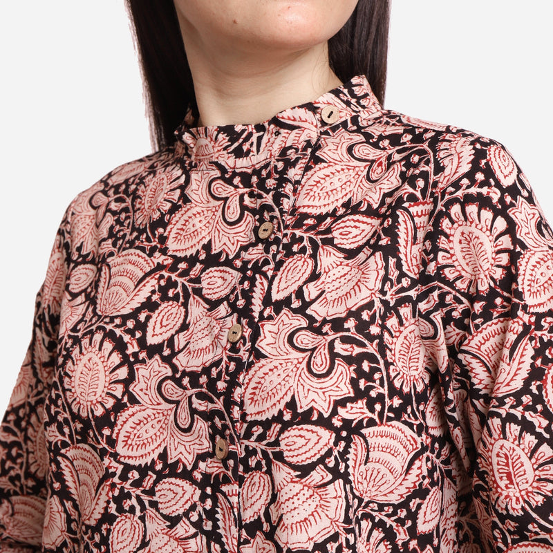 Front Detail of a Model wearing Black Floral Block Printed Asymmetric Cotton Shirt