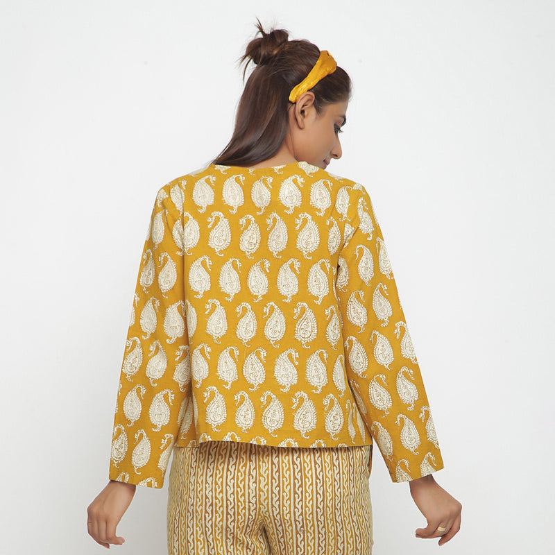Back View of a Model wearing Mustard Bagru Block Printed High-Low Cotton Top
