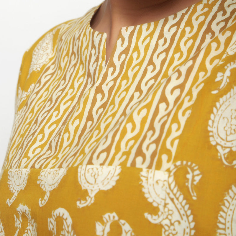 Front Detail of a Model wearing Mustard Bagru Block Printed High-Low Cotton Top