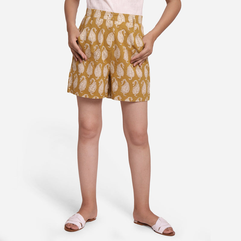Front View of a Model wearing Mustard Paisley Block Print Cotton Shorts