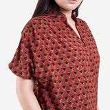 Front Detail of a Model wearing Red Floral Block Printed Cotton Knee Length Shirt Dress