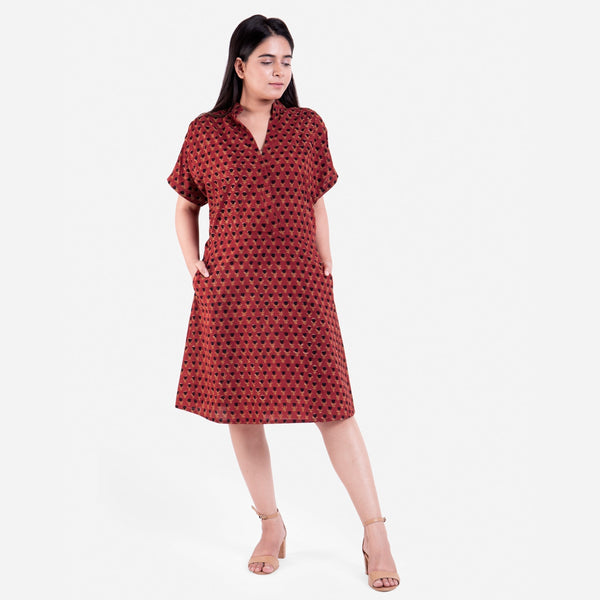 Front View of a Model wearing Red Floral Block Printed Cotton Knee Length Shirt Dress