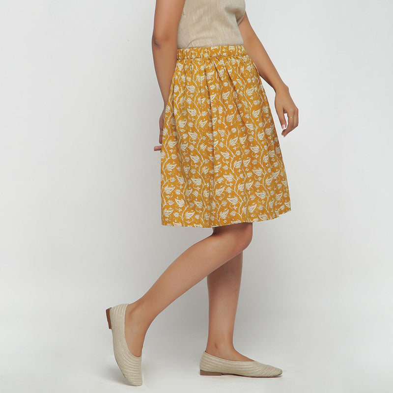 Right View of a Model wearing Bagru Print Mustard Mid Rise Skirt