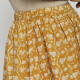 Right Detail of a Model wearing Bagru Print Mustard Mid Rise Skirt