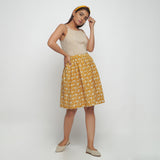 Front View of a Model wearing Bagru Print Mustard Mid Rise Skirt