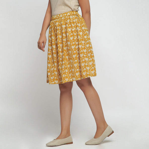 Left View of a Model wearing Bagru Print Mustard Mid Rise Skirt