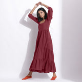 Left View of a Model wearing Barn Red Cotton Honeycomb Waffle Tier Dress