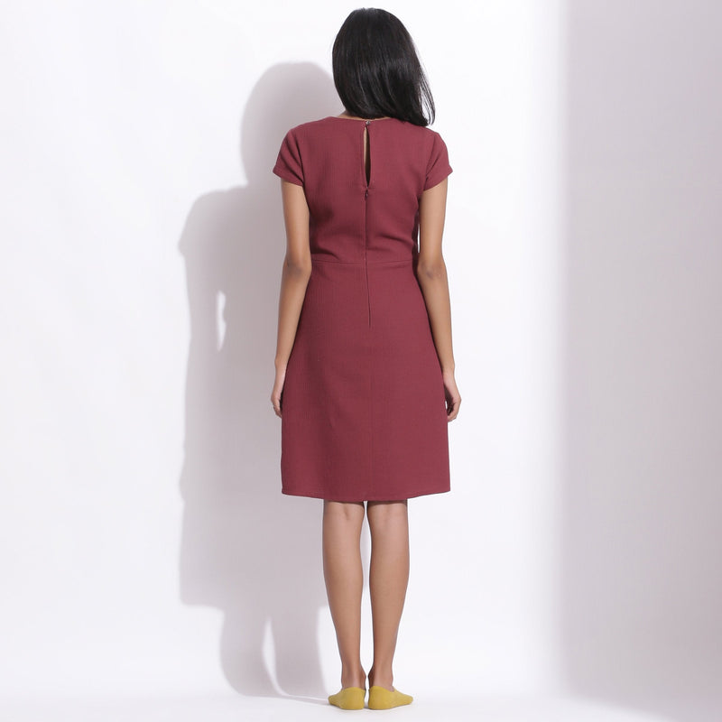Back View of a Model wearing Barn Red Warm Cotton Waffle Knee Length Paneled Dress