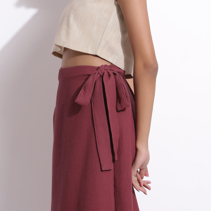 Left Detail of a Model wearing Barn Red Cotton Waffle Wrap Skirt