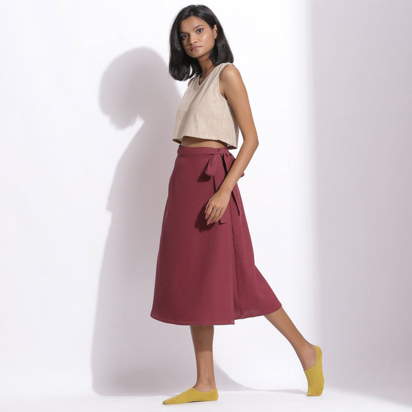 Left View of a Model wearing Barn Red Cotton Waffle Wrap Skirt
