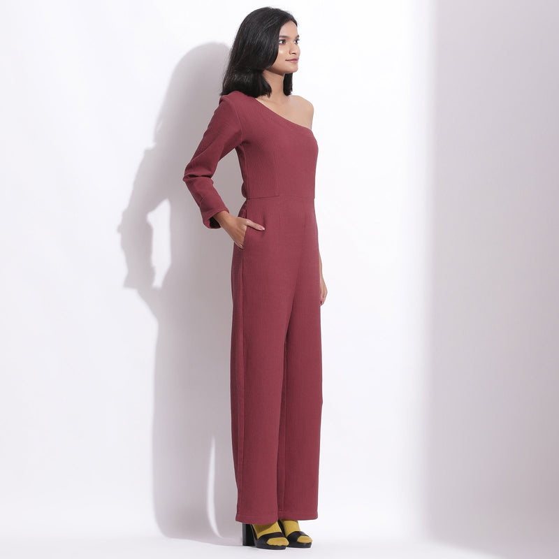 Right View of a Model wearing Barn Red Honeycomb One-Shoulder Jumpsuit