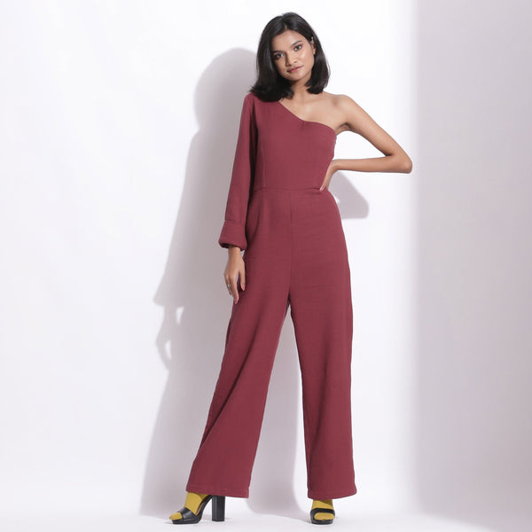 Front View of a Model wearing Barn Red Honeycomb One-Shoulder Jumpsuit