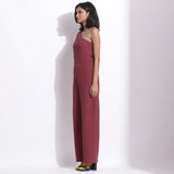Left View of a Model wearing Barn Red Honeycomb One-Shoulder Jumpsuit