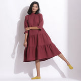 Front View of a Model wearing Barn Red Warm Cotton Waffle High Neck Midi Dress