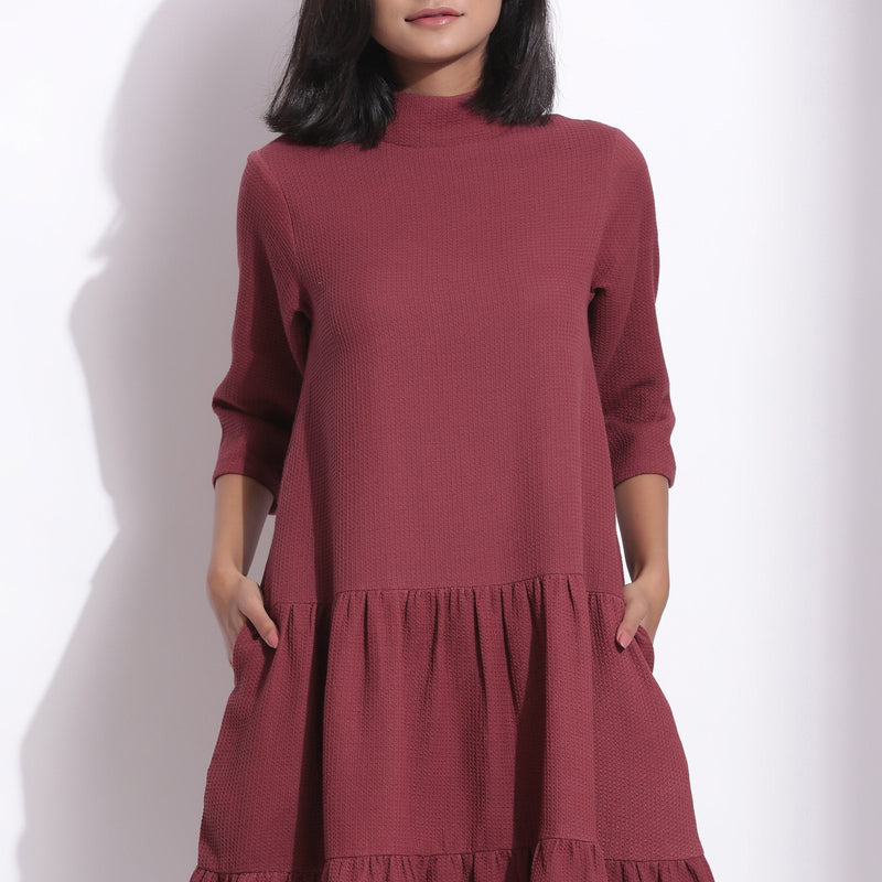 Front Detail of a Model wearing Barn Red Warm Cotton Waffle High Neck Midi Dress