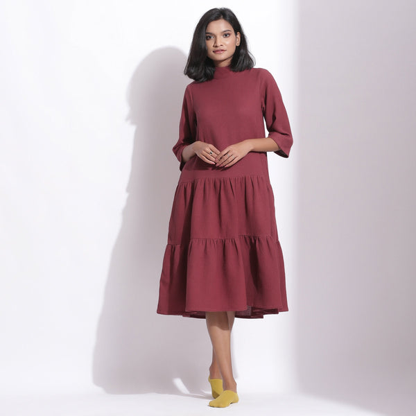 Front View of a Model wearing Barn Red Warm Cotton Waffle High Neck Midi Dress