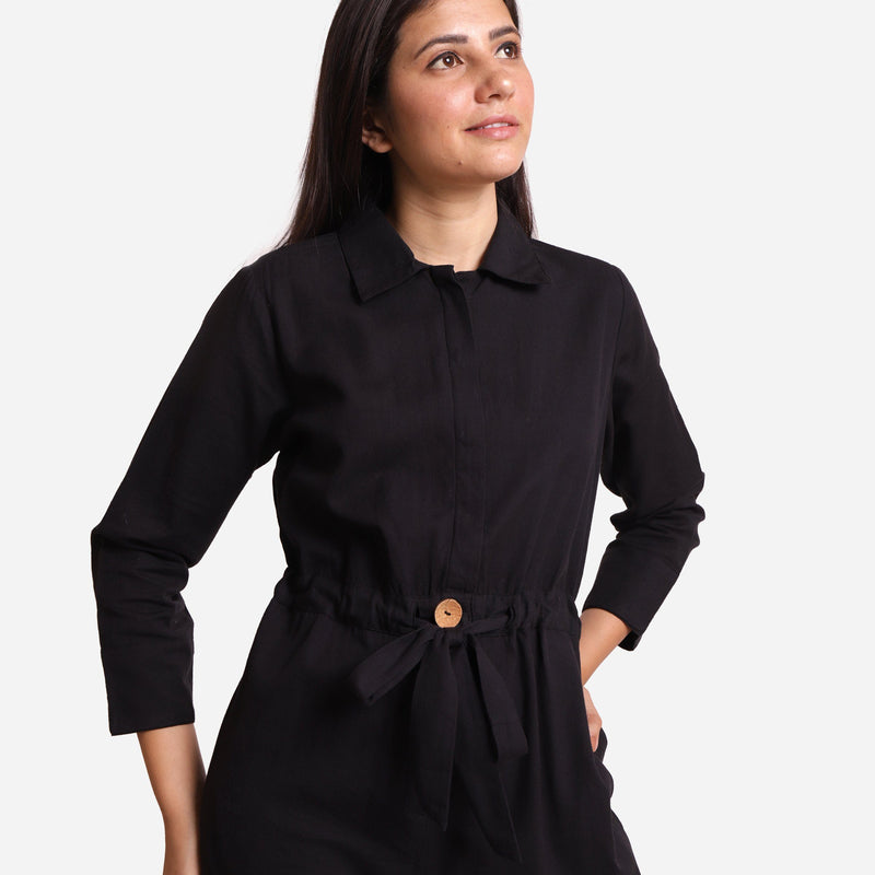 Front Detail of a Model wearing Black Wide Legged Cotton Overall