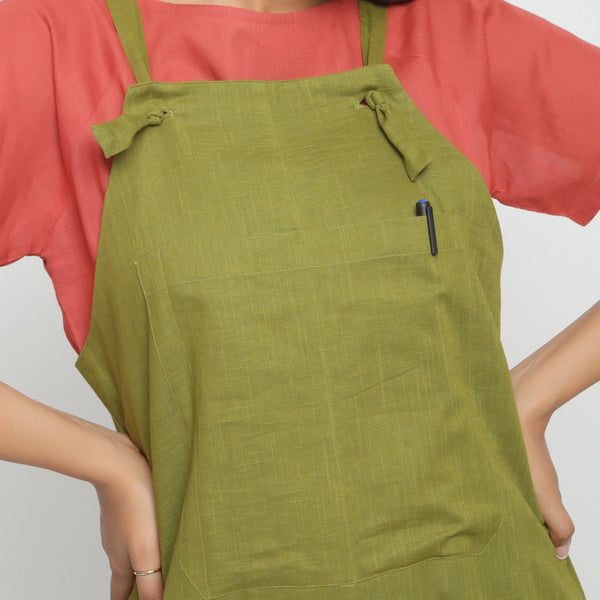Front Detail of a Model wearing Olive Green Strap Sleeve Solid Dungaree