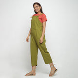 Left View of a Model wearing Olive Green Strap Sleeve Solid Dungaree