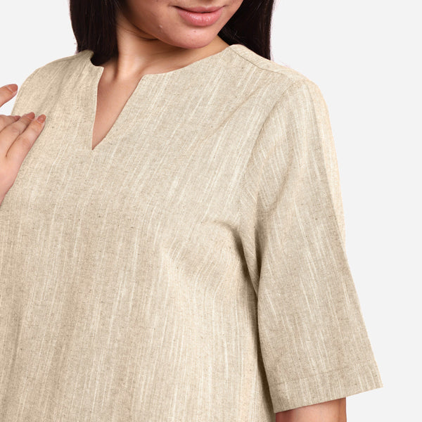 Front Detail of a Model wearing Beige 100% Cotton High Low Tunic Top