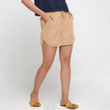 Right View of a Model wearing Beige 100% Cotton Low-Rise Short Shorts