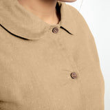 Front Detail of a Model wearing Beige 100% Cotton Peter Pan Collar Shirt