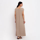 Back View of a Model wearing Beige Cotton Flax A-Line Paneled Dress