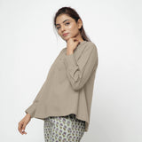 Left View of a Model Wearing Beige Cotton Flax Straight Yoked Top