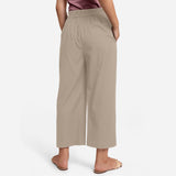 Back View of a Model wearing Beige Cotton Flax Wide Legged Pant