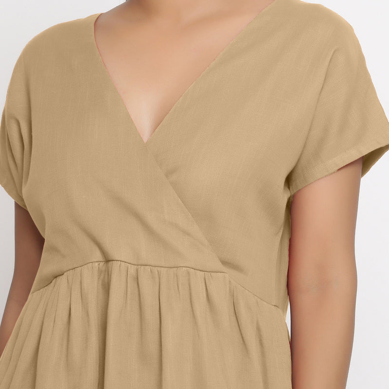 Front Detail of a Model wearing Beige Cotton Solid Wrap Dress