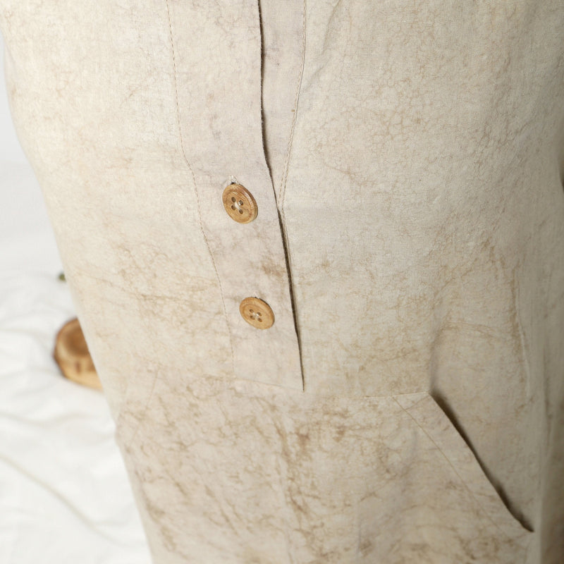 Close View of a Model wearing Beige Dabu Cotton Button-Down Dress