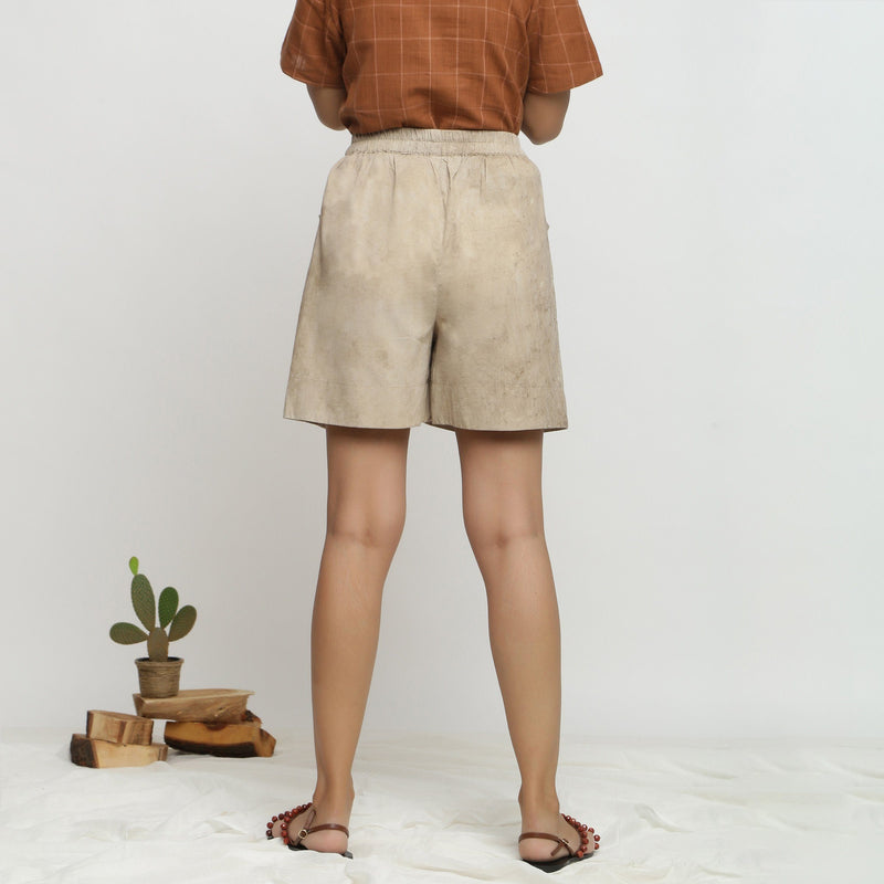 Back View of a Model wearing Beige Dabu Print Cotton Flared Shorts