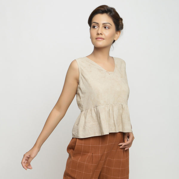 Right View of a Model wearing Beige Dabu Printed Embroidered Cotton Gathered Yoke Top