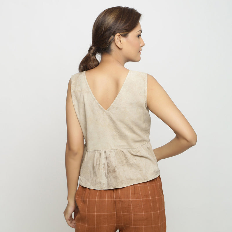 Back View of a Model wearing Beige Dabu Printed Embroidered Cotton Gathered Yoke Top