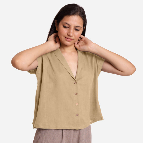 Front View of a Model wearing Beige Deep Neck Button-Down Cotton Top