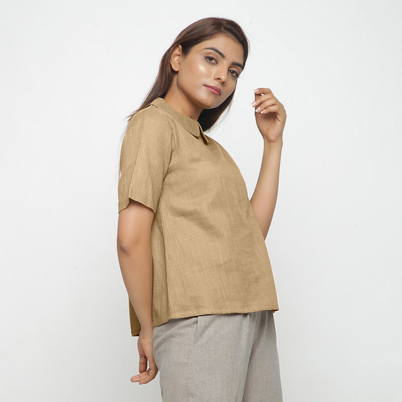 Right View of a Model wearing Beige Everyday Essential A-Line Top