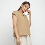 Right View of a Model wearing Beige Puff Sleeves Cotton A-Line Top