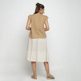 Back View of a Model wearing Beige Puff Sleeves Cotton A-Line Top