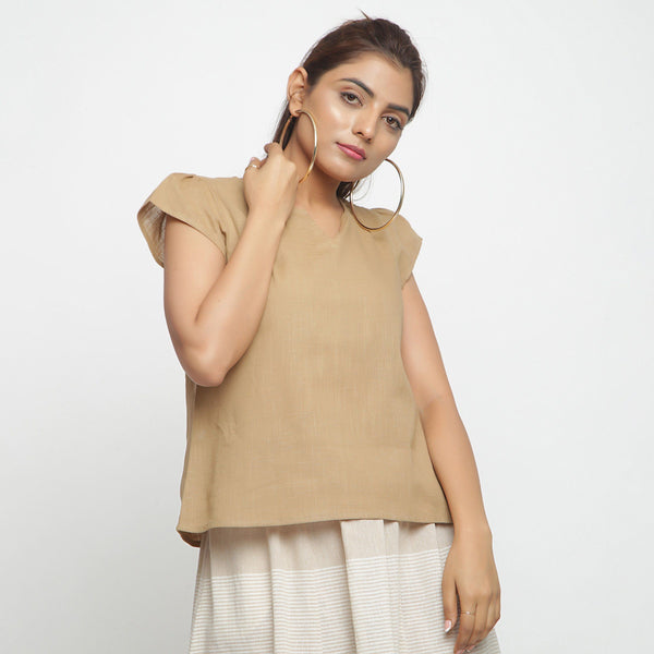 Front View of a Model wearing Beige Puff Sleeves Cotton A-Line Top