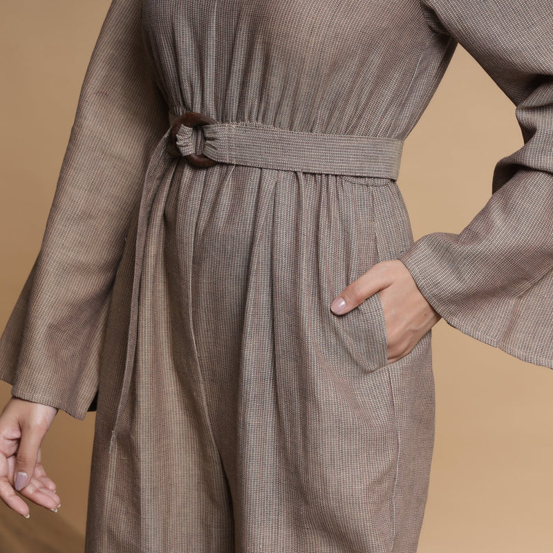Front Detail of a Model wearing Beige Flared Sleeve Gathered Jumpsuit