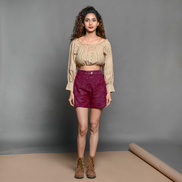Front View of a Model wearing Beige Frilled Crop Top and Mulberry Shorts set