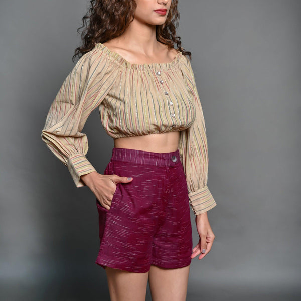Front Detail of a Model wearing Beige Frilled Crop Top and Mulberry Shorts set
