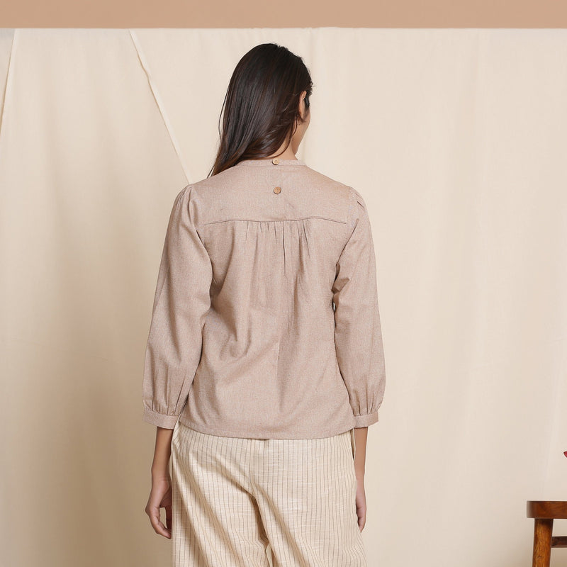 Back View of a Model wearing Dusk Brown Straight Gathered Top