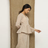 Right View of a Model wearing Beige Handspun Full Sleeve V-Neck Wrap Top