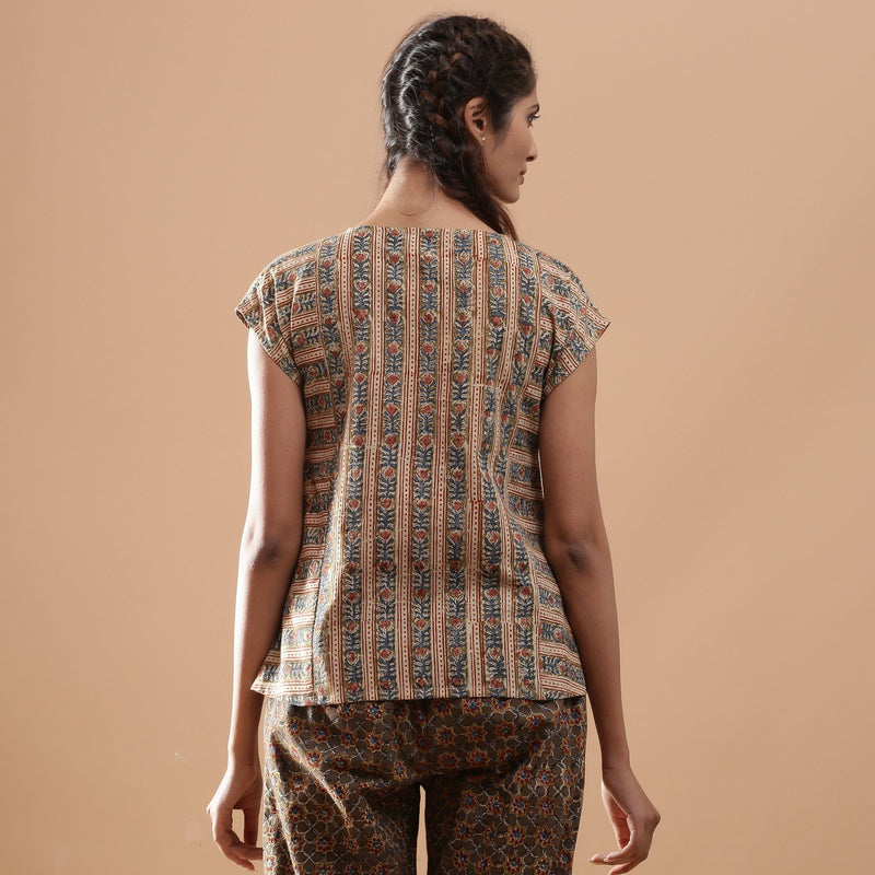 Back View of a Model wearing Beige Kalamkari A-Line Striped Top
