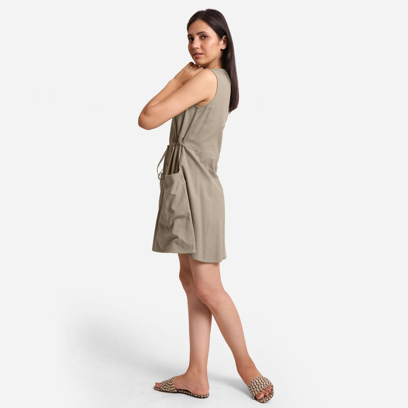 Left View of a Model wearing Beige Patch Pocket Round Neck Dress