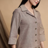 Front Detail of a Model wearing Beige Relaxed Fit Button Down Shirt