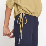 Right Detail of a Model wearing Solid Navy Blue Cotton Flax Culottes
